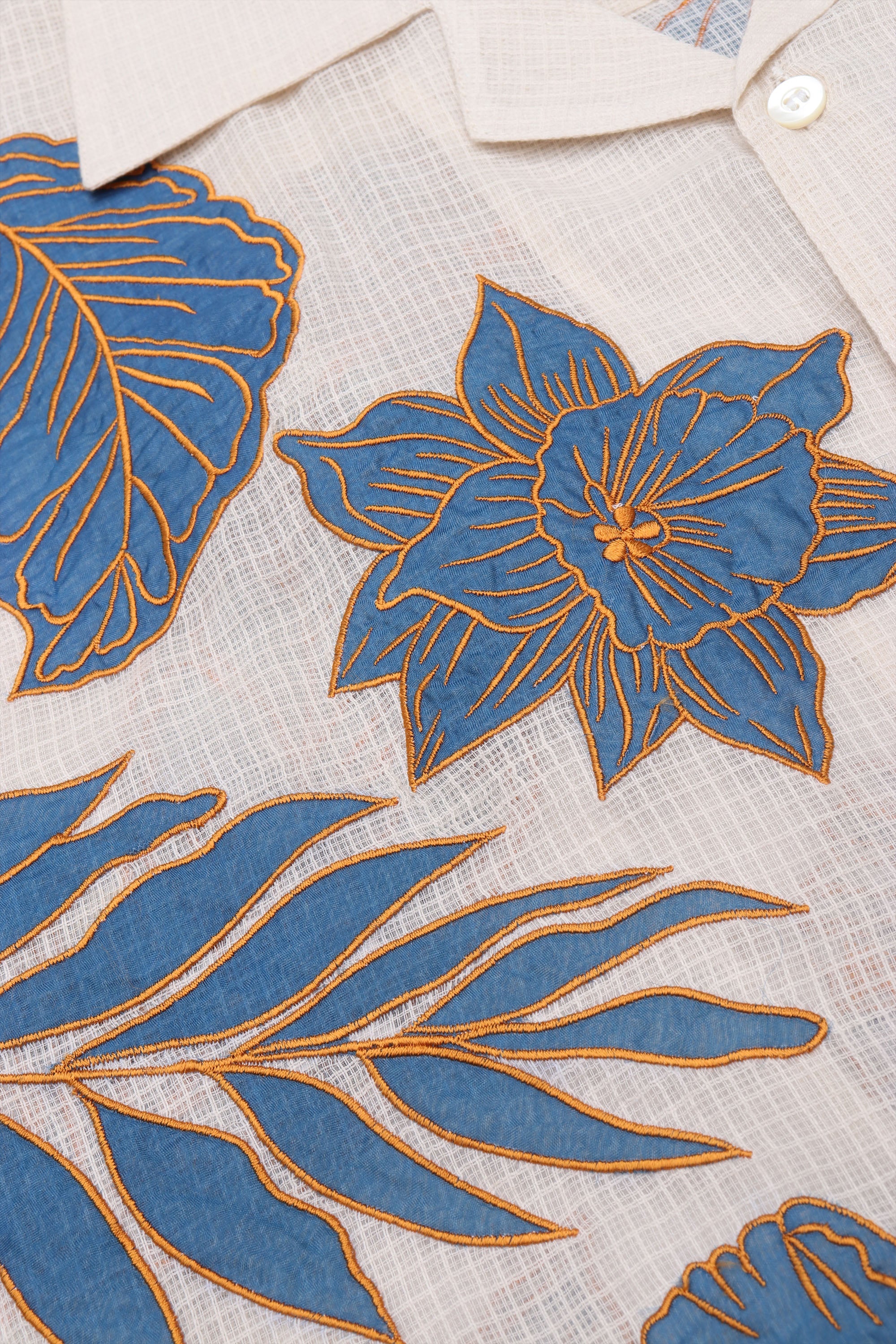 Blue floral appliqué shirt