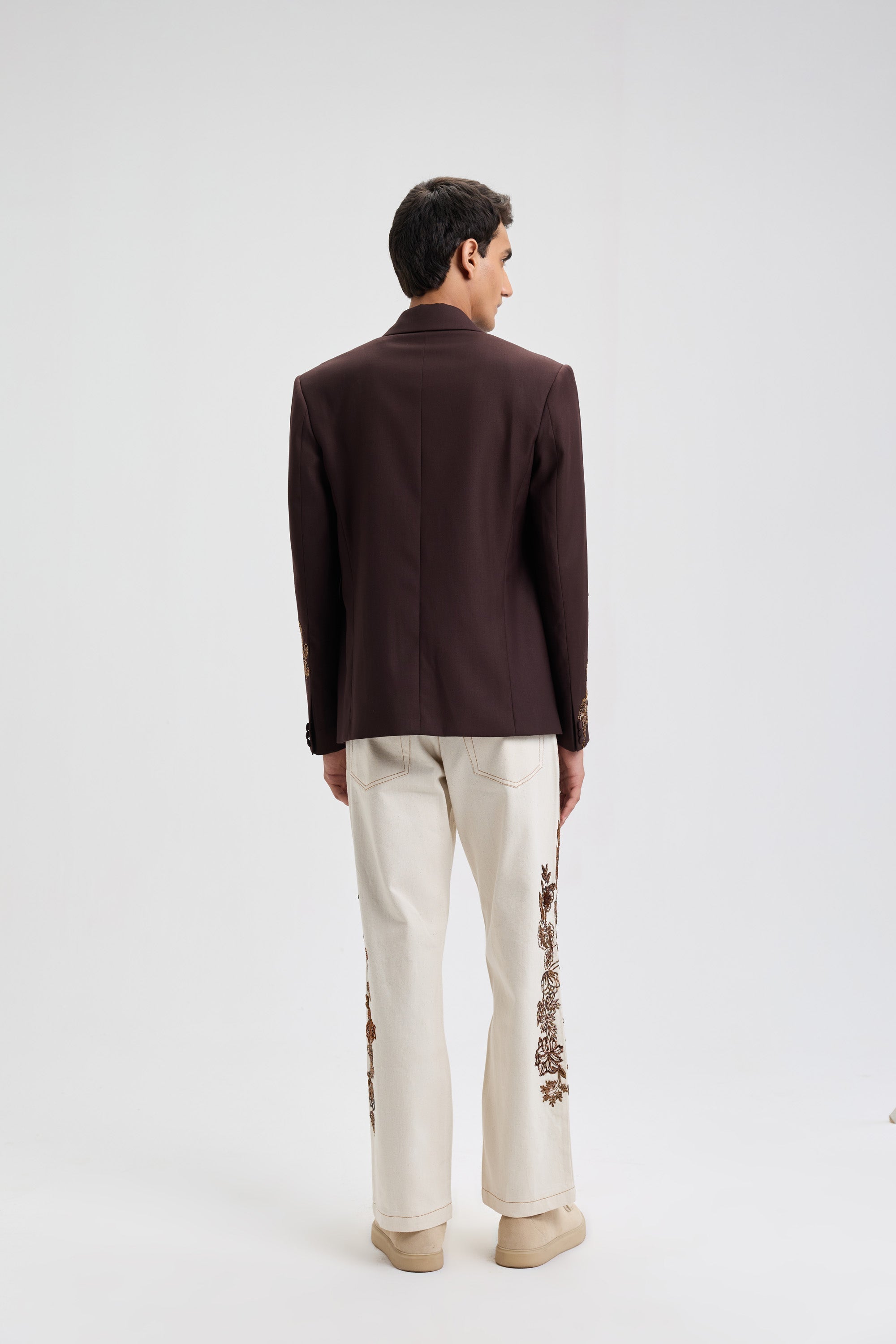 Ecru embroidered denim pants
